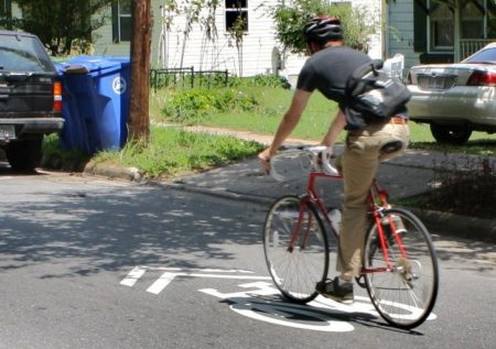 man riding bike