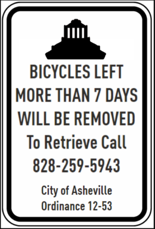 sign that says bicycles left for more than 7 days will be removed.