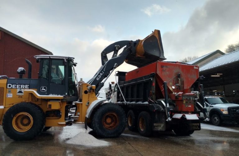 Loading salt spreader truck