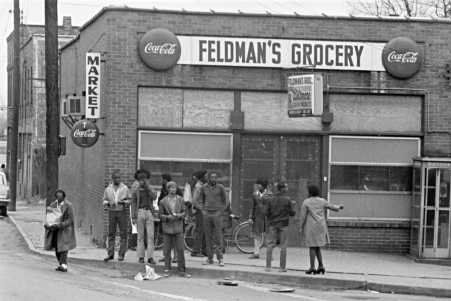 people milling around Feldman's grocery