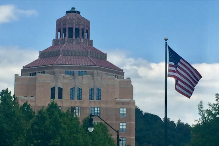 Asheville City Hall, flag flying in foreground