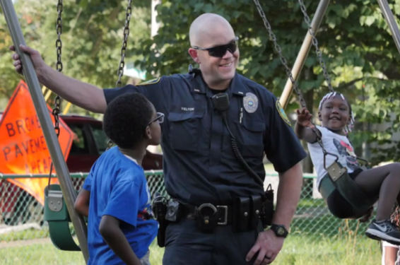 Officer with children from National Night Out 2018