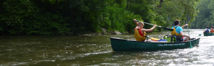kids canoeing down the river