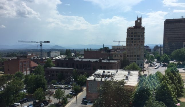 Two cranes for construction building in downtown asheville
