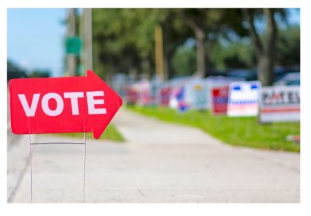 voting sign outside of a polling place