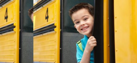 Teacher Resource linked to image of child on a school bus smiling