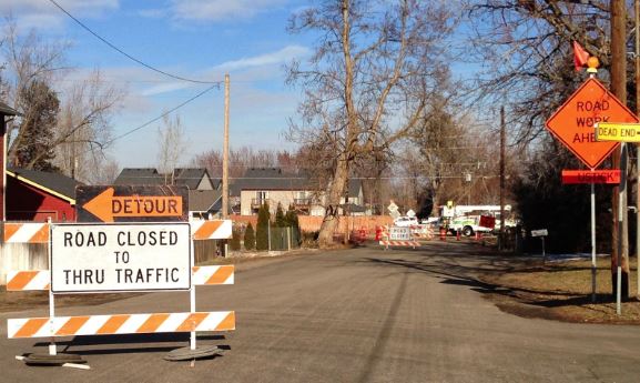 Detour, road closed sign