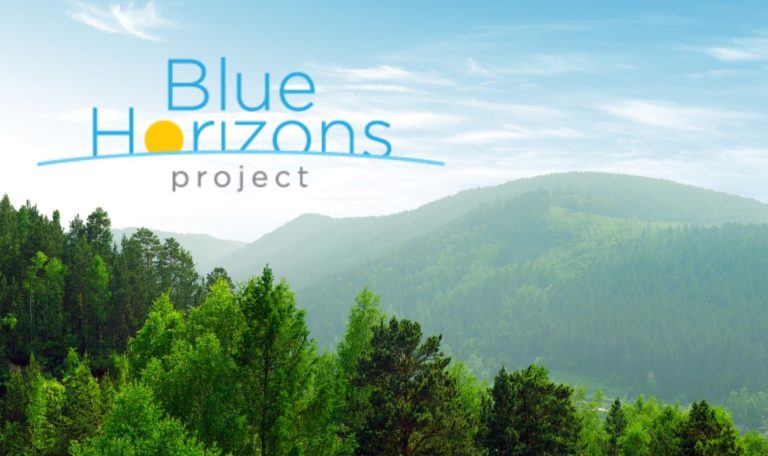 Blue Horizons Project logo with mountains photo
