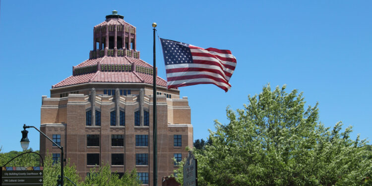 City Hall photo with flag