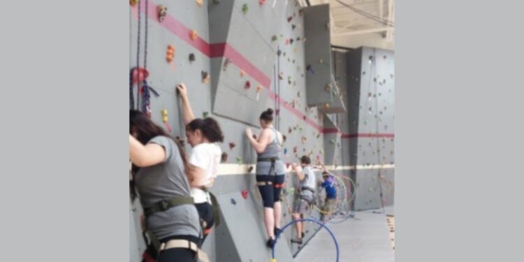 Tempie Avery Montford Center climb wall