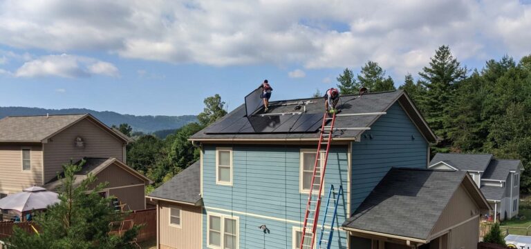 installing solar panels on residential roof