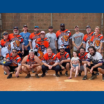 softball team in orange shirts