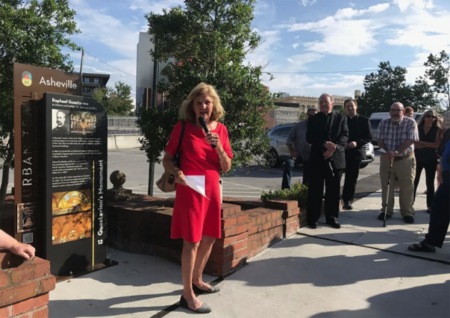 grace pless speaking at event