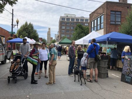 shoppers at farmers market downtown