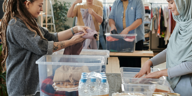 group of women assembling food packages