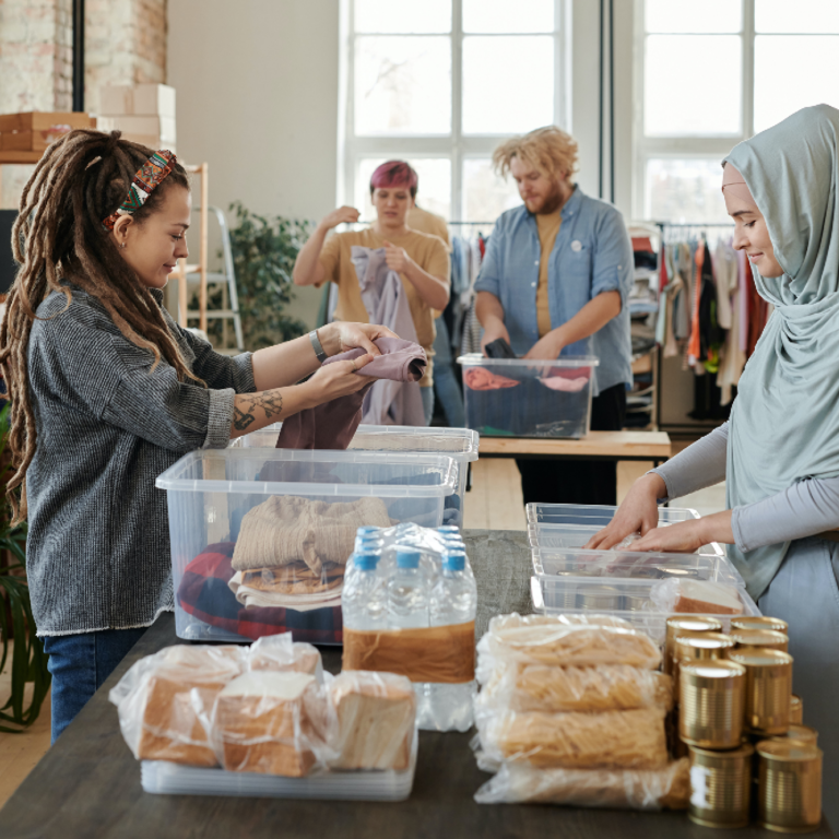 group of women assembling food packages