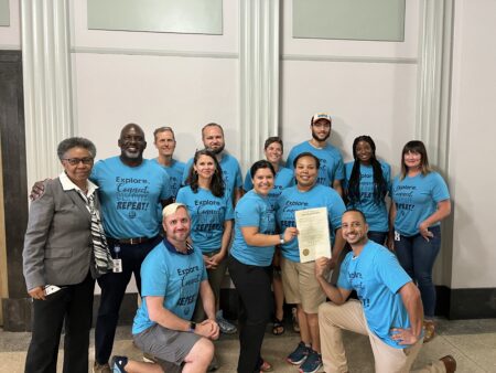 parks and rec department staff recognized in proclamation pose for group photo