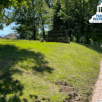 brick sidewalks and monument sign at aston park