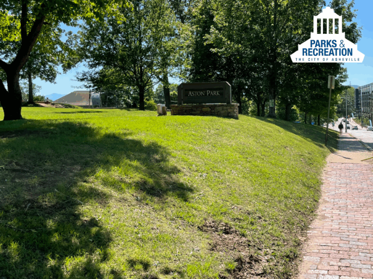 brick sidewalks and monument sign at aston park