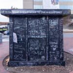 public art piece with chalk writing