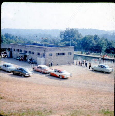 Walton Street Pool and Pool house with 1950s cars parked nearby