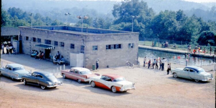 Walton Street Pool and Pool house with 1950s cars parked nearby