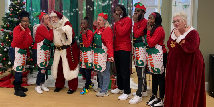 children gather around santa