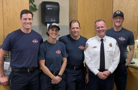 Anna Pigman with Chief and AFD team members