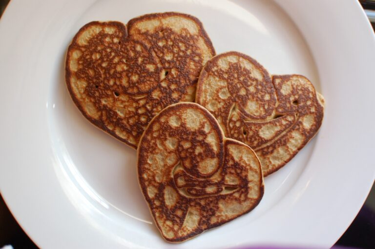 heart shaped pancakes on white plate