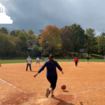 people playing kickball