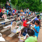 people sitting on bleachers