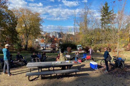 oakhurst neighbors gathered around a picnic table