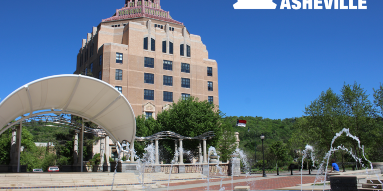 city hall with splash pad in front on sunny day