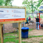 entrance to temporary dog park in riverbend park