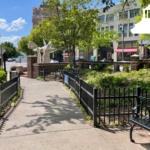 bench, walking path, and sculpture