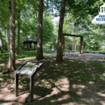 swings, small shelter, and history walk