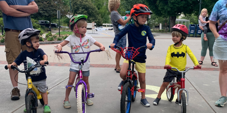 young children on small bikes