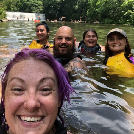 lori long in water with recreation program participants