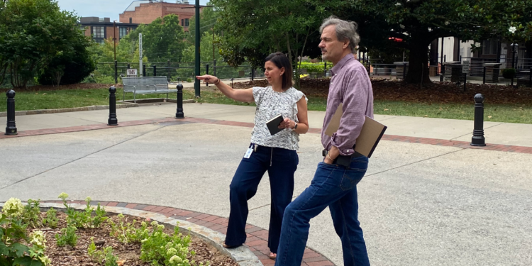 al kopf and susannah horton looking towards front of city hall
