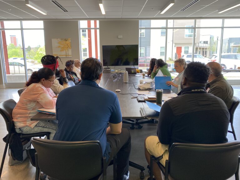 Photo of O.U.R. Asheville Academy participants in a hybrid learning session in Asheville, NC.