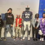 group of children from Shiloh community center on spring break trip to college hall of fame.
