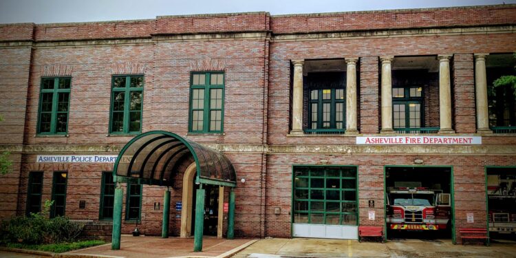 front entrance of municipal building showing Asheville Police Department and Asheville Fire Department
