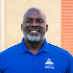 D. Tyrell McGirt wearing blue shirt