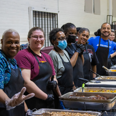 group of ladies serving food