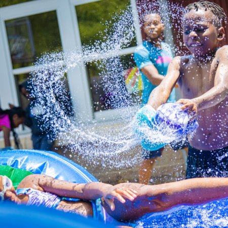 kids playing with water toys