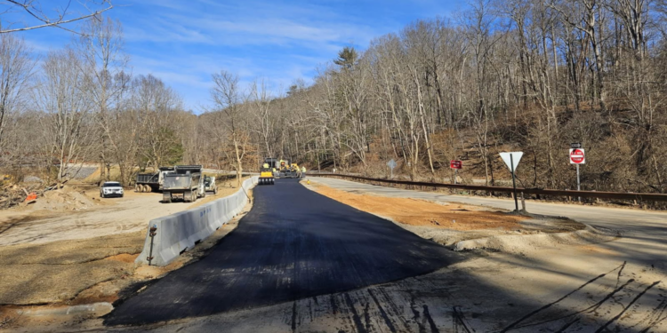 PW crews working to repave a road in gashes creek