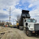 crews working to repave hiawassee with equipment