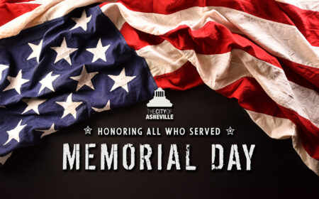 city seal in front of flag with words honoring all who served memorial day