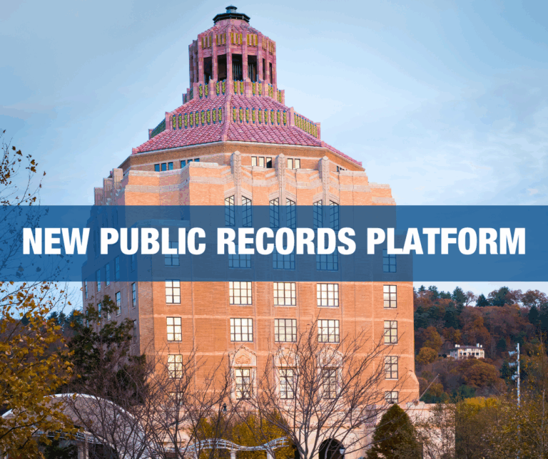 Picture of city hall with the grpahics " New Public Rocrds Platorm" imposed in an overlay