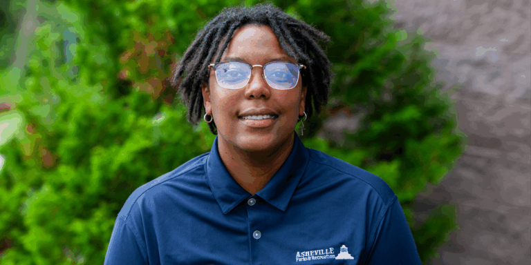 maria young wearing blue Asheville Parks & Recreation shirt